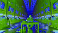 Winston, broken and defeated, sitting at his desk in the Ministry of Truth.