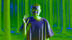 Once se encuentra en un oscuro bosque, vistiendo una bata de hospital, con la mano elevada, concentrándose en sus poderes telequinéticos.