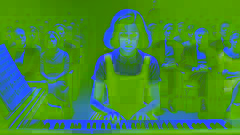 Frances pauses mid-performance on stage, her face flushed with anxiety as the audience sits in uncomfortable silence.