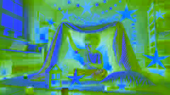 A child smiles inside a blanket fort decorated with lights, lost in imagination.