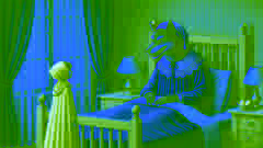 The wolf dressed as grandmother in bed, talking to Little Red Riding Hood.