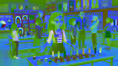 Ada Twist presenta su experimento de imanes a sus compañeros de clase y a un maestro en la feria de ciencias de la escuela.
