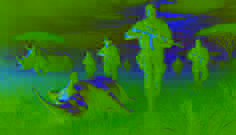 Rangers move through the grass at night, confronting poachers near a fallen rhino while Baraka watches in the background.