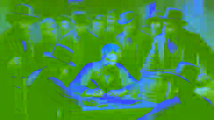Ned Kelly writing his famous Jerilderie Letter, with his gang members gathered around him in a rustic room.