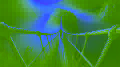 Traveler cautiously crossing the Q'eswachaka rope bridge at dawn with mist below