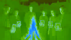 Residents burning stacks of Crying Boy prints at a community bonfire in Britain