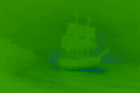 A ghostly ship illuminated by an uncanny green glow as it glides over dark waters