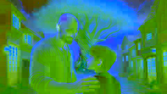 Hasan Kachal, bald and determined, placing a reassuring hand on the shoulder of the young boy who dreams of adventure.