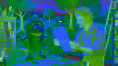Duncan lee la carta del crayón verde rodeado de exuberantes árboles verdes, hierba y ranas.
