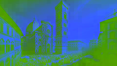 The completed Bell Tower of Giotto with citizens gathering around in awe and reverence beside the grand Duomo.