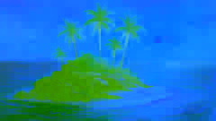 Sunrise breaking over the newly formed island dotted with young palms and rocky outcrops