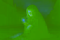 Faint warm glow illuminates a girl striking a match in the dark