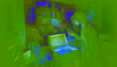 Eleanor discovering a locked chest in the attic, surrounded by old belongings and a torn photograph.