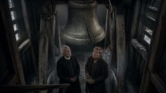 In the tower, the old wound waits where sound once failed the valley.