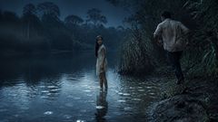 Where no moon shone above, a road of light opened among the reeds.