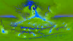A dragon emerges from a barrow, fire illuminating a terrified Geatish village below.